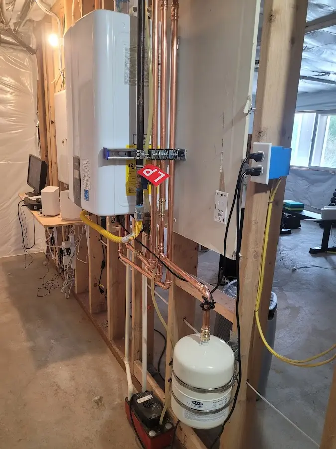Licensed plumber repairing a kitchen sink in Johnstown